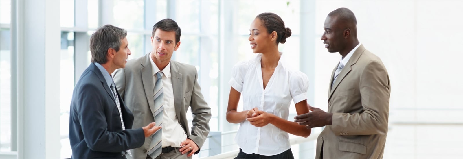 Group of people talking in an office